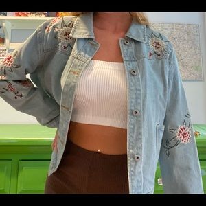 Light wash jean jacket with flower embroidery